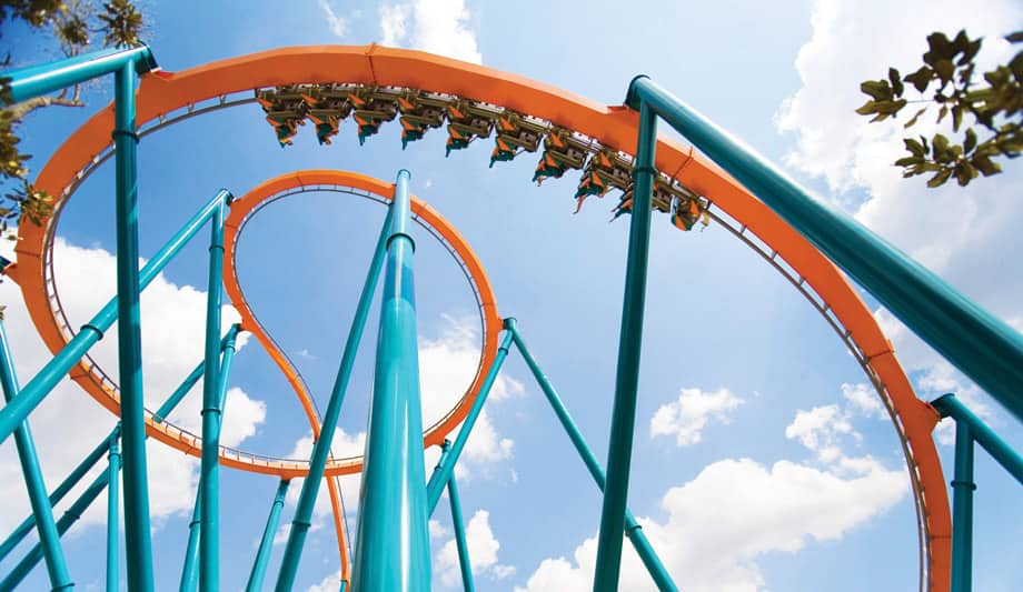 Orange and teal roller coaster, mid loop