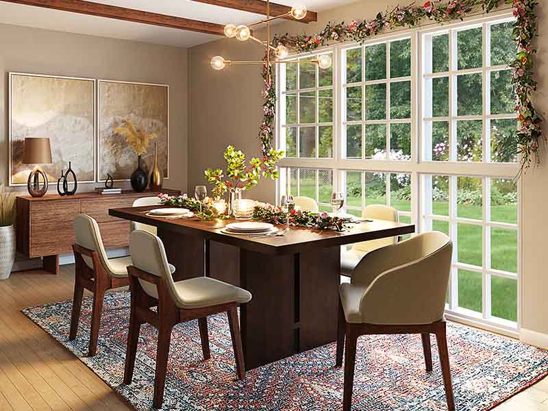 Warm neutral dining room with table settings, wood table and centerpieces
