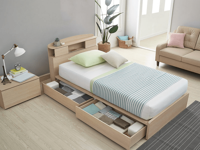 Bed with drawers built into the platform