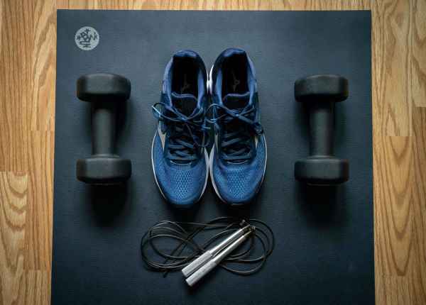 sneakers free weights and jump rope