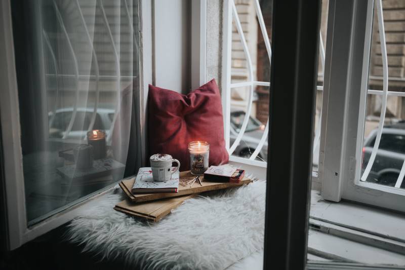 hygge reading nook in window