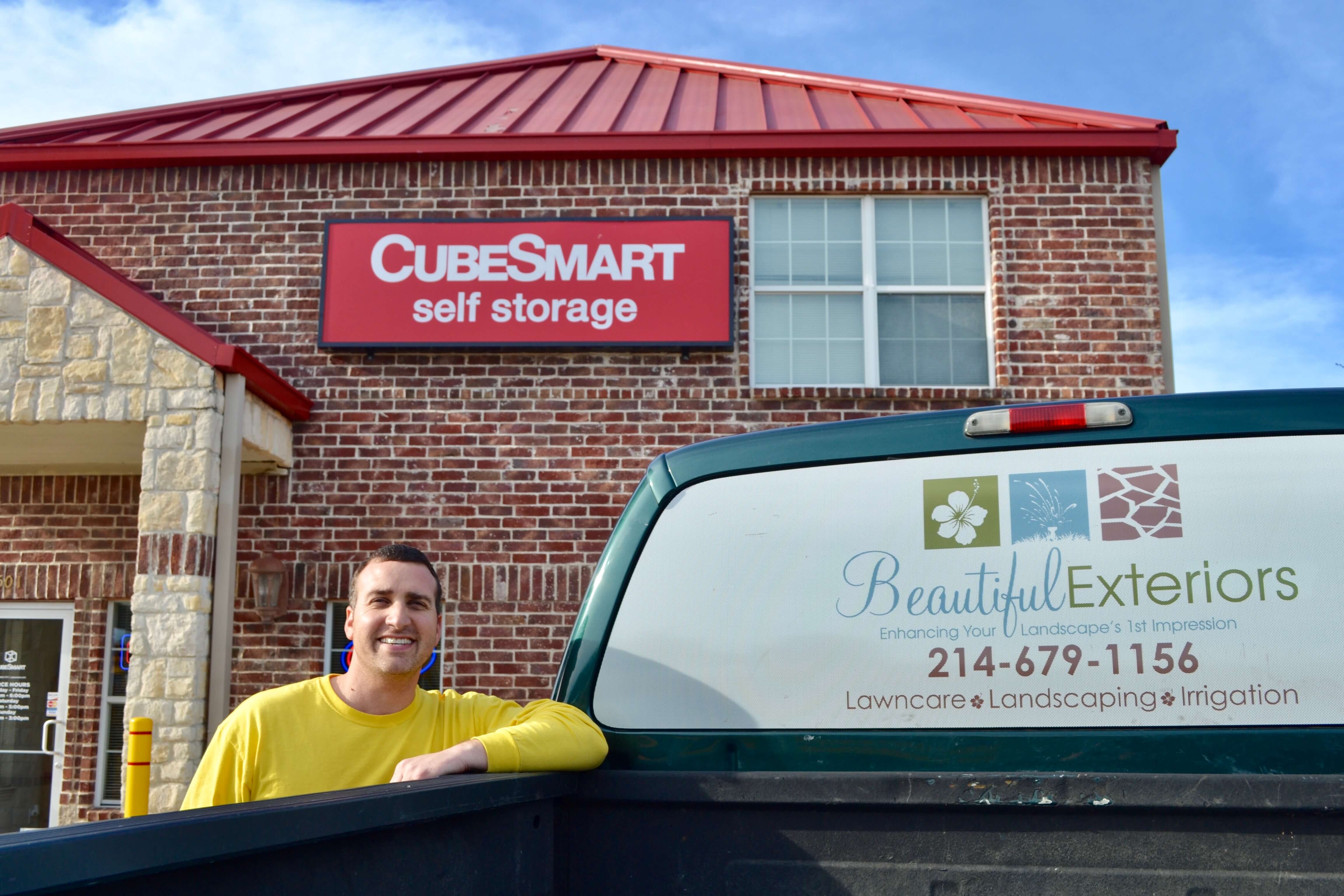 Kurt Patterson standing next to his work truck outside CubeSmart