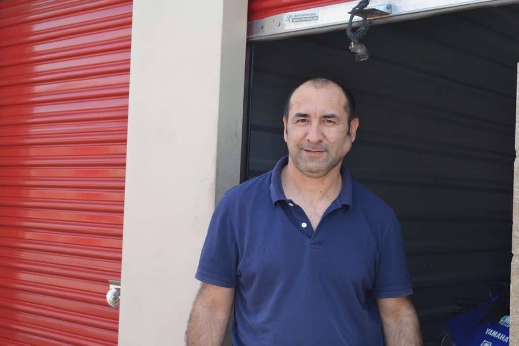 Tomas R. outside of his CubeSmart storage unit