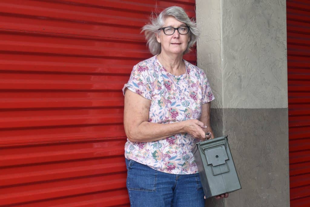 Pauline Tal standing in front of her storage unit