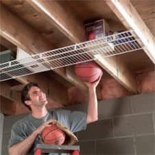 man using ceiling storage