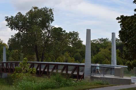 person walking in Buffalo Bayou Park in Houston