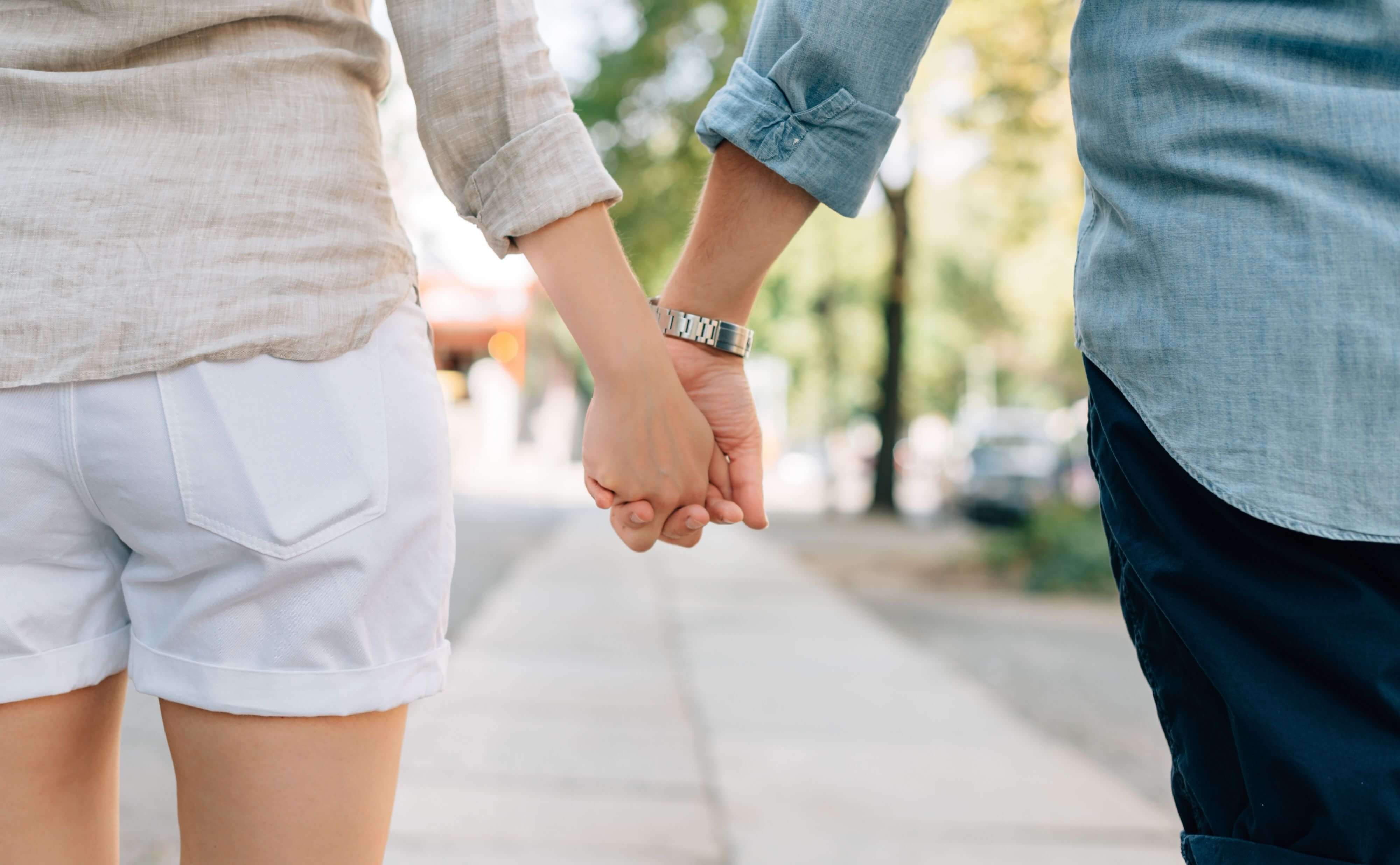 couple holding hands