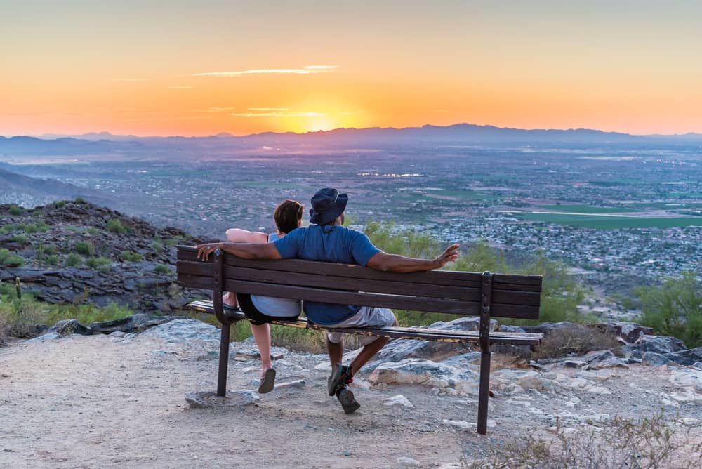 couple watches sunset in Phoenix Arizona