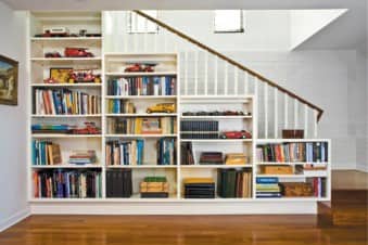 built-in bookshelves along the stairs