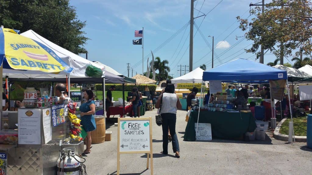 people shopping at a farmers market in Tamarac, Florida