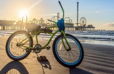 bike on Galveston Beach at sunset