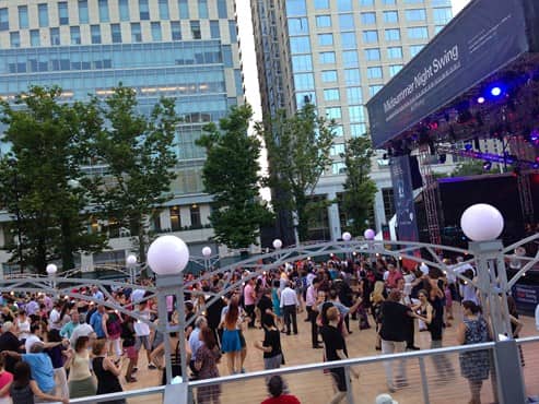 people swing dancing at Midsummer Night's Swing in NYC