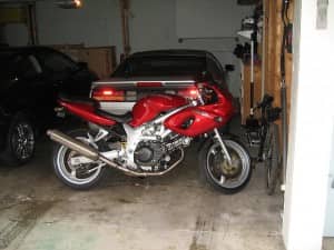 red motorcycle in a garage