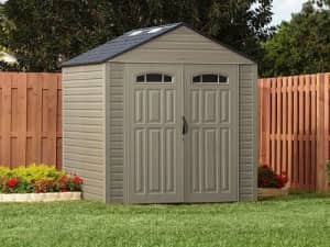 gray shed in a backyard