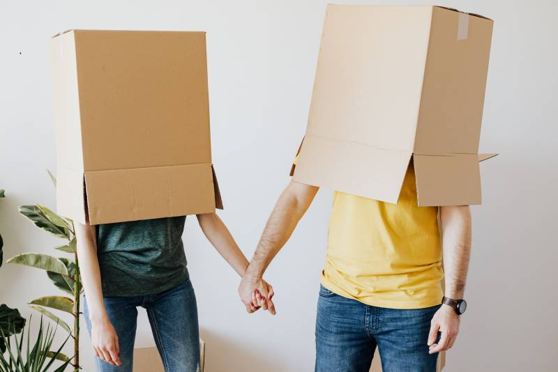 moving boxes over head