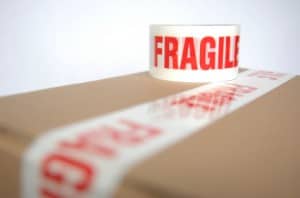 fragile tape on top of a box