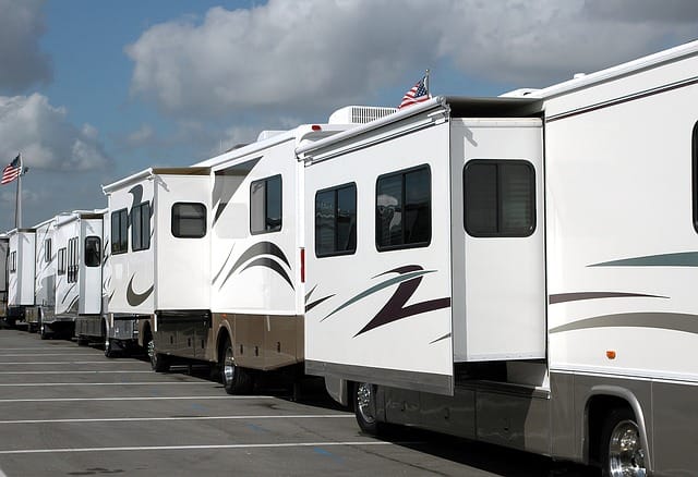 RVs lined up in parking lot