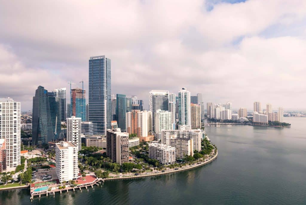 view of the Miami skyline and the water from the side