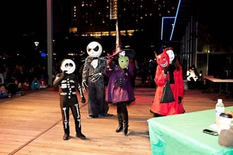 children in Halloween costumes