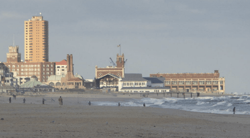 view of the boardwalk and beach at Asbury Park